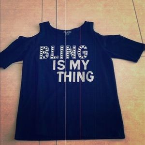 An of the shoulder shirt for a 16 year old girl